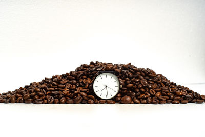 Close-up of coffee on table against white background