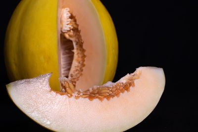 Close-up of fruit against black background
