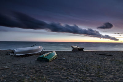 Scenic view of beach against sky during sunset