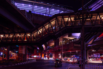 Neoncity bangkok - mrt station in bangkok at night with concrete pedastrian crossings