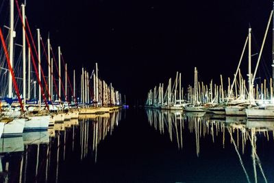 Boats moored at harbor