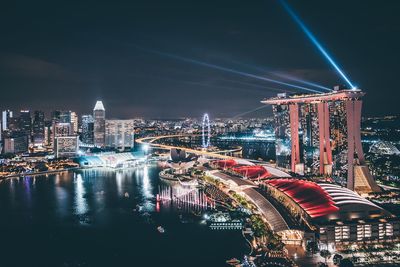 Illuminated buildings in city at night