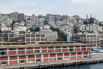 Buildings in city against sky