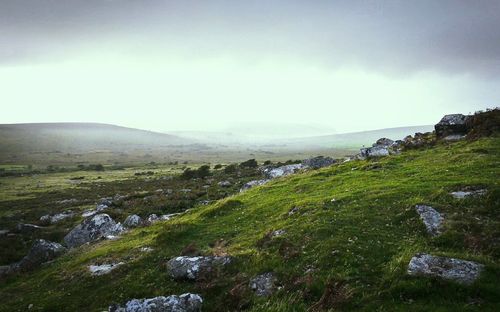 View of stream along countryside landscape