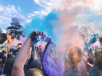 Group of people enjoying holi