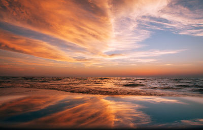 Scenic view of sea against sky during sunset