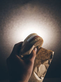 Close-up of hand holding bread