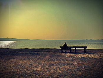 Scenic view of sea at sunset