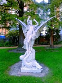 Sculpture of fountain in park