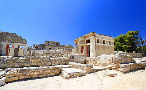 View of old ruin building against blue sky