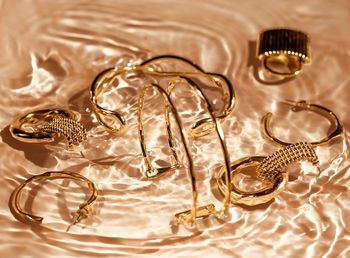 High angle view of wedding rings on table