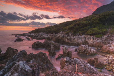 Scenic view of sea against sky during sunset