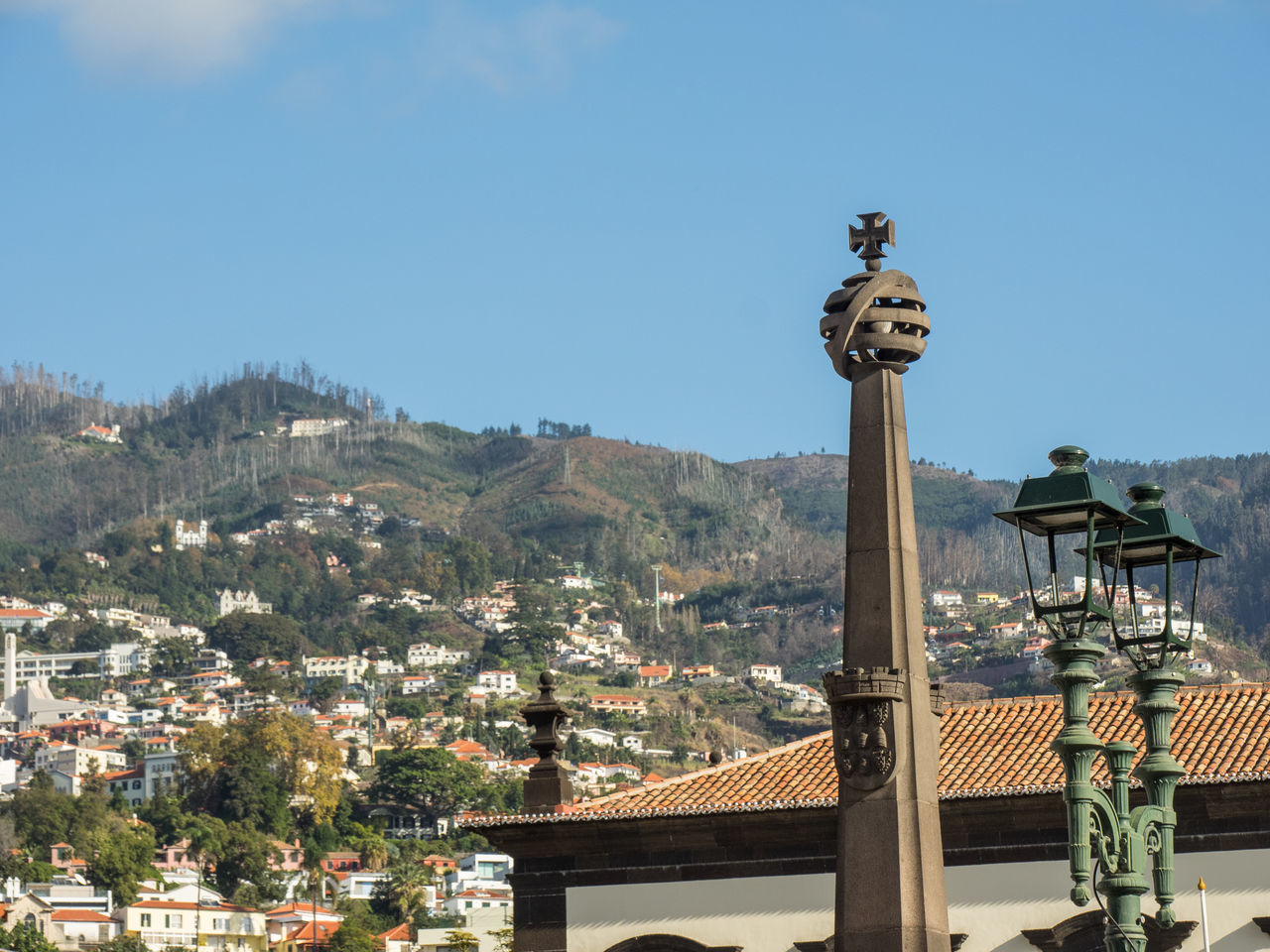 SCULPTURE OF BUILDINGS AGAINST SKY