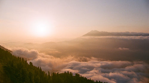 Scenic view of mountains against sky during sunset