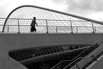 Low angle view of railing against sky