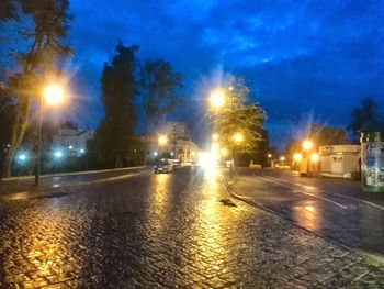 Illuminated street light at night