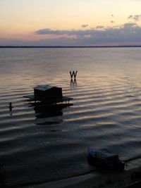 Scenic view of sea at sunset