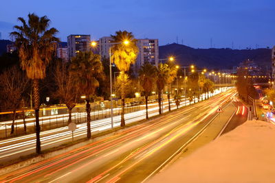 Illuminated city at night during winter