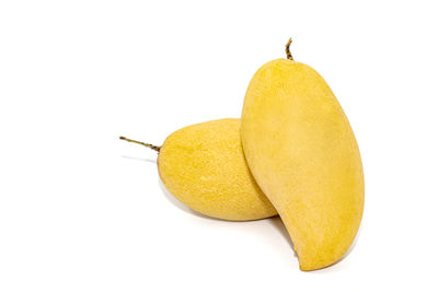 Close-up of fruits against white background