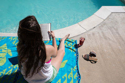 High angle view of woman at swimming pool