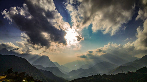Scenic view of mountains against sky during sunset