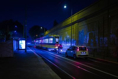 Cars on road at night