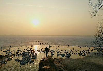 Scenic view of sea against sky during sunset