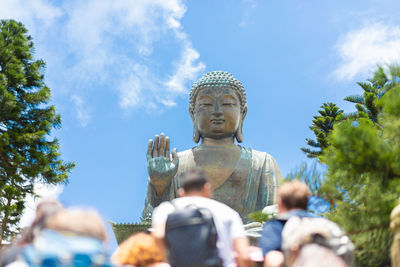 Low angle view of statue against sky