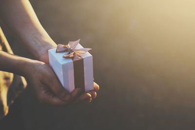 Close-up of woman holding gift box