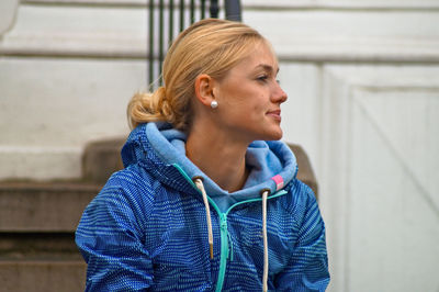 Beautiful young woman with eyes closed