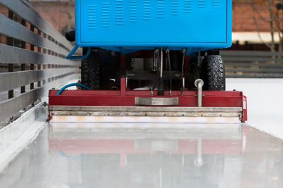  polished ice ready for match. ice maintenance machine closeup