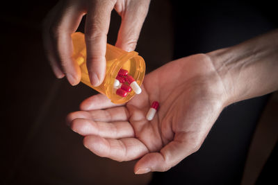 Close-up of woman holding hands