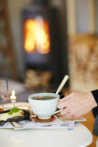 Hand with cup