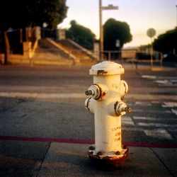 Close-up of fire hydrant on sidewalk