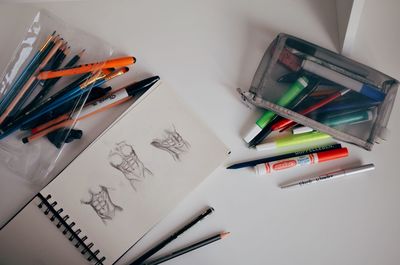 High angle view of multi colored pencils on table