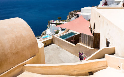 High angle view of houses by sea