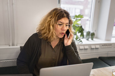 Woman talking via cell phone