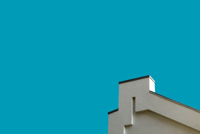 Low angle view of building against blue sky