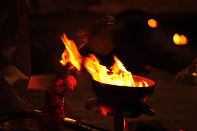 Close-up of fire burning at night