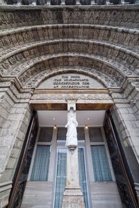 Latin inscriptions on a doorway arch of a chrch cathedral classical architecture