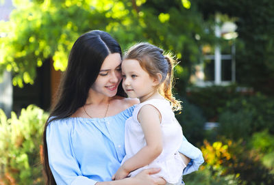 Portrait of mother and daughter