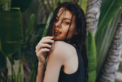 Portrait of young woman looking away