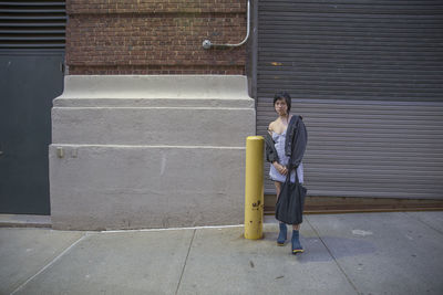 Young woman on the streets of queens, new york