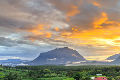 Scenic view of landscape against sky during sunset