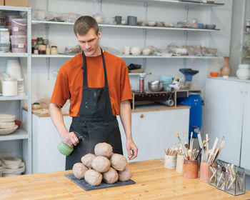 Man preparing food at table