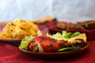 Close-up of food served on table