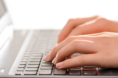 Close-up of woman using mobile phone