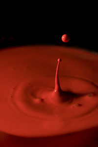 Close-up view of ice cream in black background