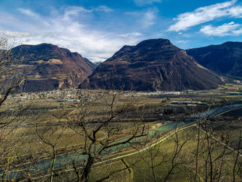 Scenic view of landscape and mountains against sky