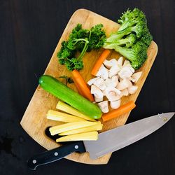 High angle view of chopped vegetables on cutting board